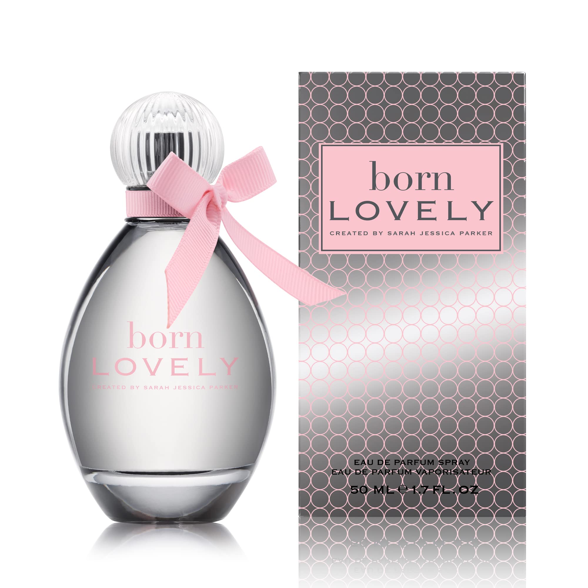Born Lovely by SJP amber floral perfume on nightstand suggests all-day presence
