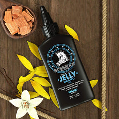 Bossman Jelly Beard Oil ingredients closeup highlights beeswax and avocado for nourishment.