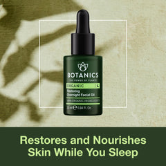 Botanics Restoring Overnight Face Oil dropper shows easy overnight application before bed.