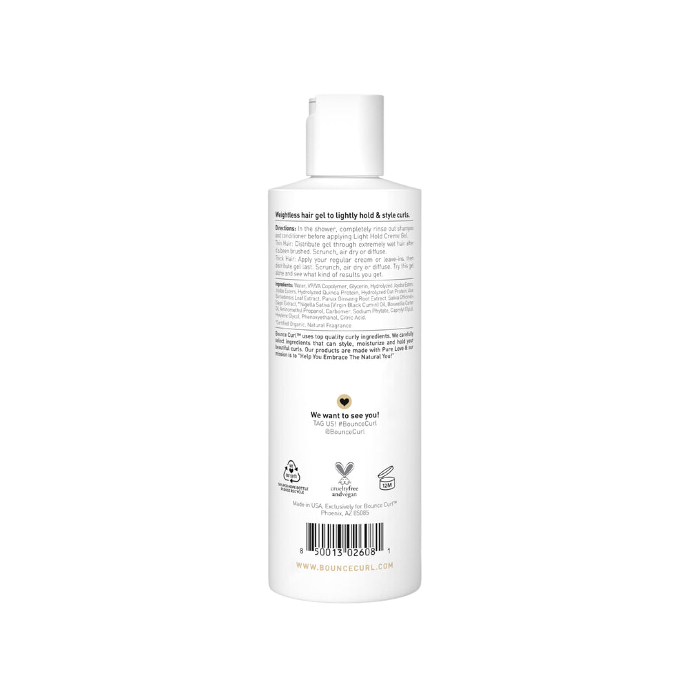 Bounce Curl product shot shows frizz-free shine and defined curls