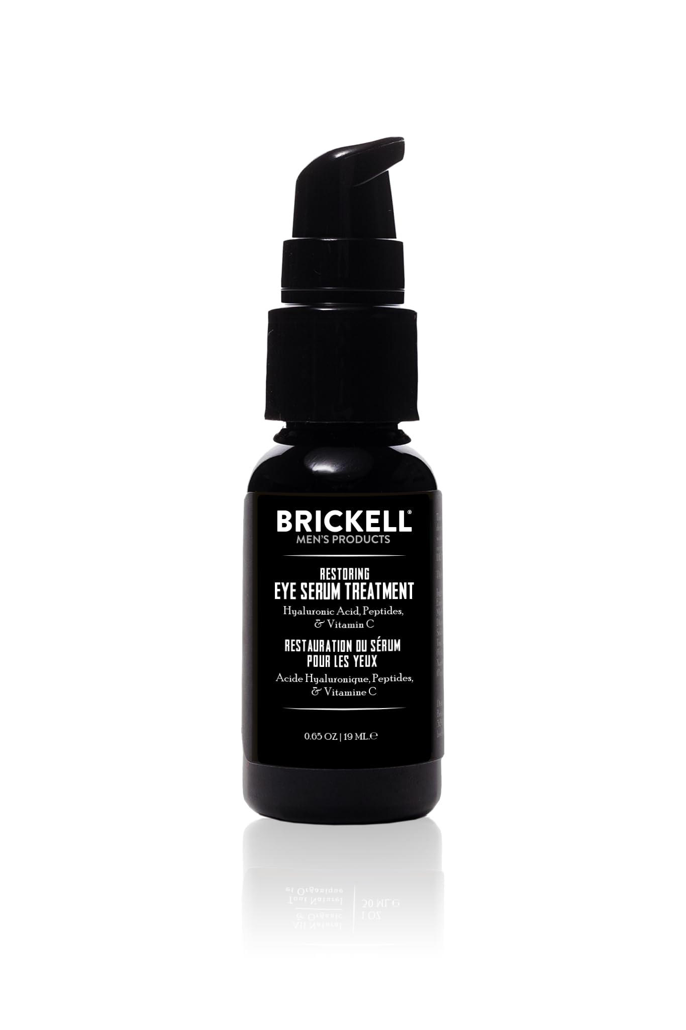 Brickell Men's Dark Circle Eye Serum bottle being applied to reduce under-eye puffiness.