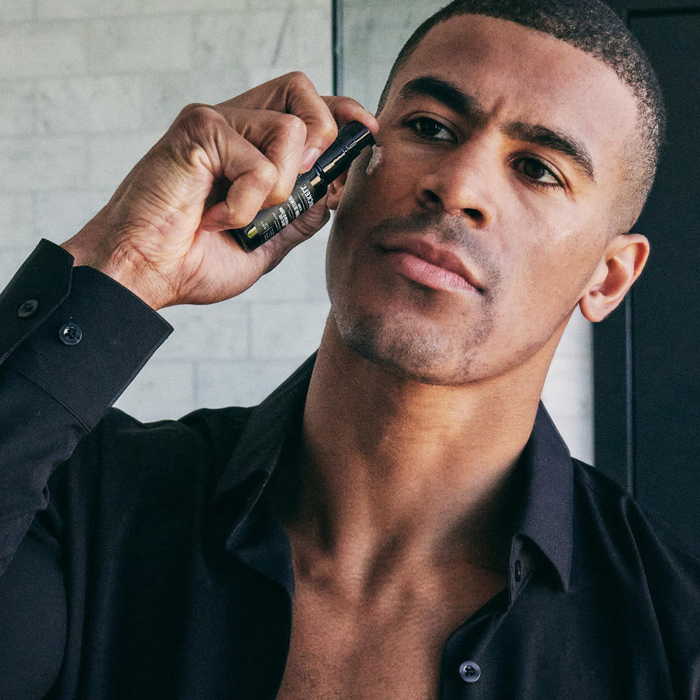 Brickell Men's Dark Circle Eye Serum under-eye close-up showing firming effect.