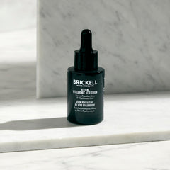Brickell Men's Anti Aging Serum ingredients label highlighting peptides and hyaluronic acid.
