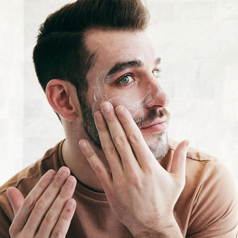 Brickell Men's Daily Defense SPF20 texture image showing light absorption on skin.