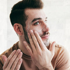 Brickell Men's Daily Defense SPF20 texture image showing light absorption on skin.