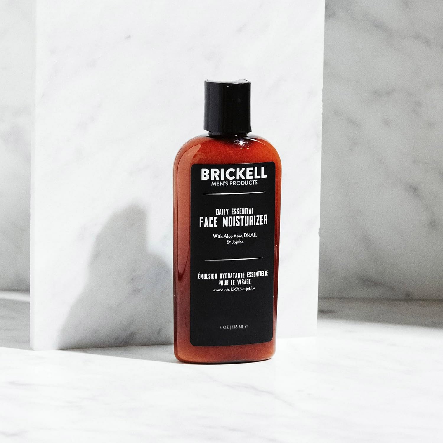 Brickell Men's Daily Essential Moisturizer in use demonstrates quick absorption for a refreshing finish.