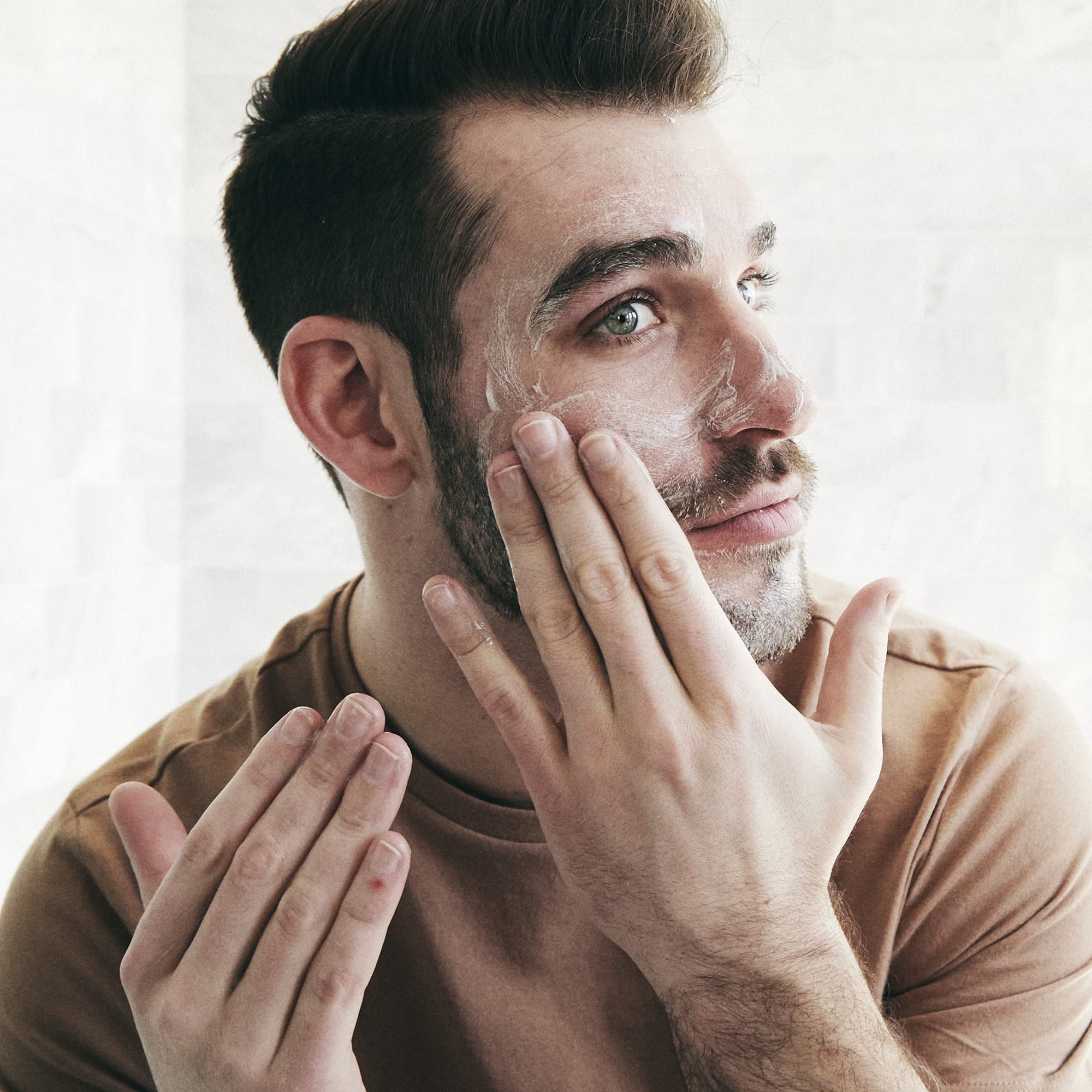 Brickell Men's Daily Essential Moisturizer closeup texture shows fast-absorbing formula for a non-greasy finish.