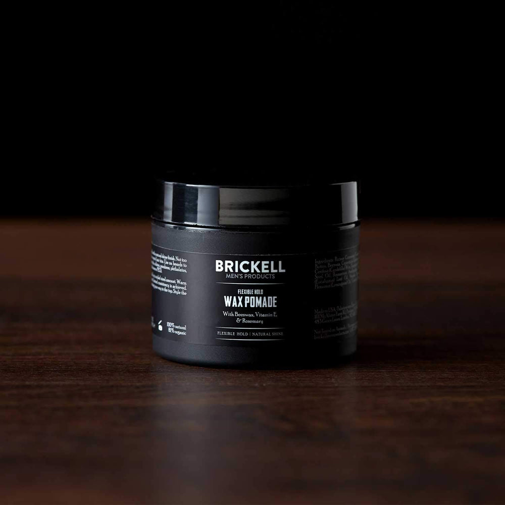 Brickell Men's Flexible Hold Pomade hands rub to reveal creamy consistency.