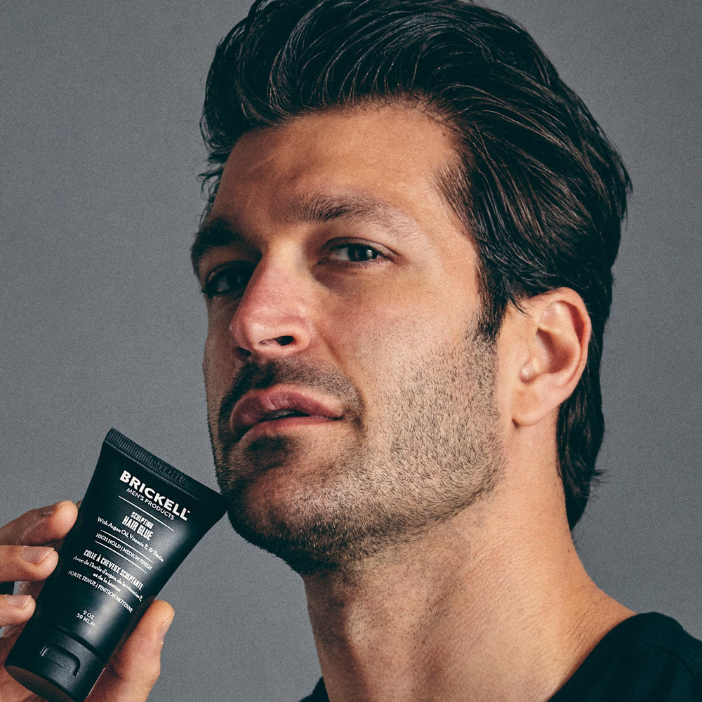 Brickell Men's Hair Glue paraben-free formula splash communicates clean composition.