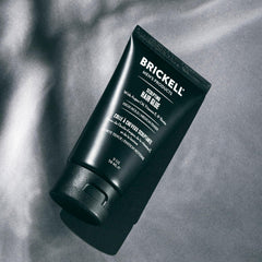 Brickell Men's Hair Glue close-up of textured style for defined finish.