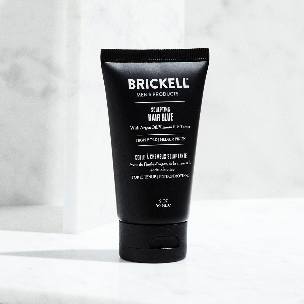 Brickell Men's Hair Glue vitamin E drop promotes hair protection.