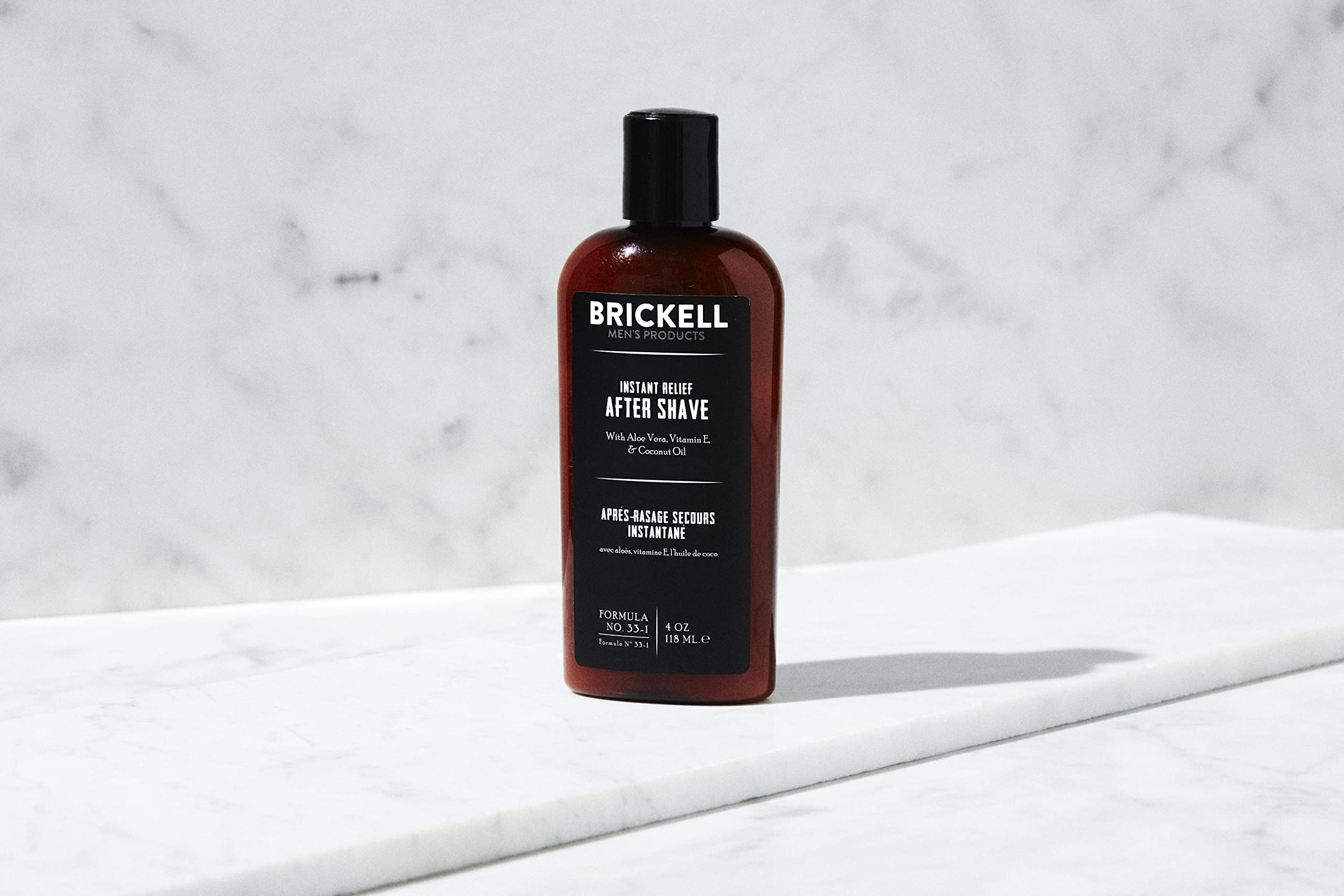 Brickell Men's Instant Relief aftershave bottle—fast-absorbing relief after shaving.