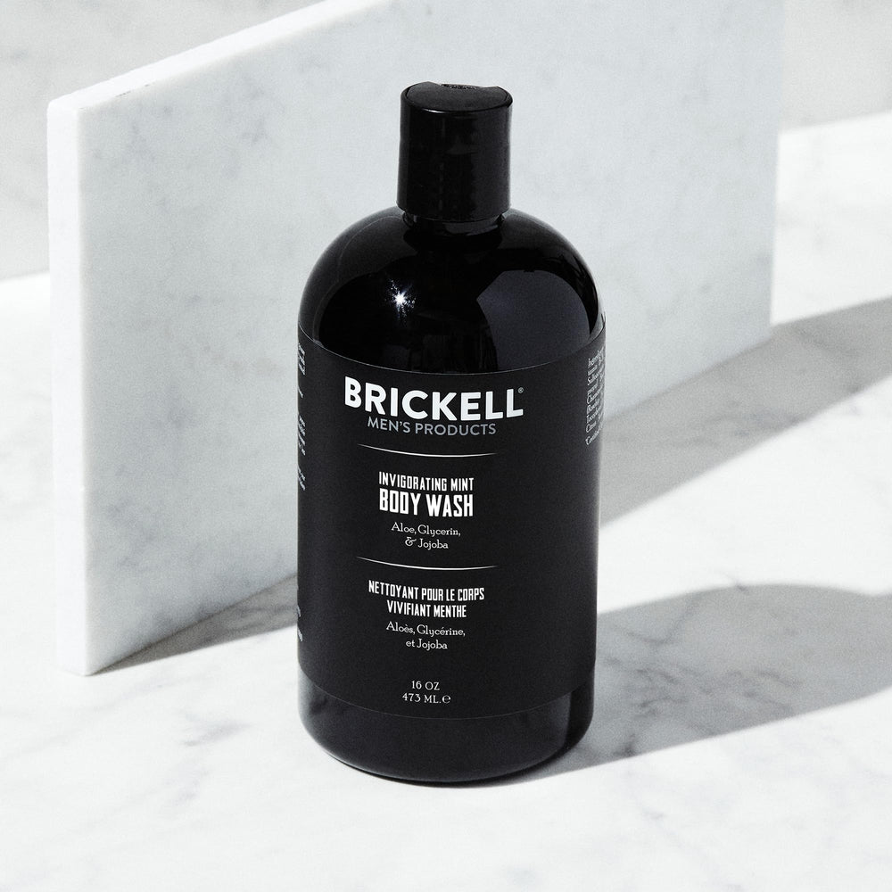 Brickell Men's Invigorating Mint Body Wash bottle pour – easy dispense for quick, refreshing showers.