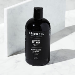 Brickell Men's Invigorating Mint Body Wash bottle pour – easy dispense for quick, refreshing showers.