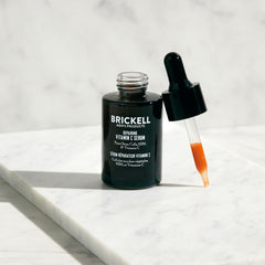 Brickell Men's night serum on skin during sleep for renewal.