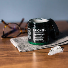 Brickell Men's Purifying Charcoal Face Mask bottle closeup shows activated charcoal formula