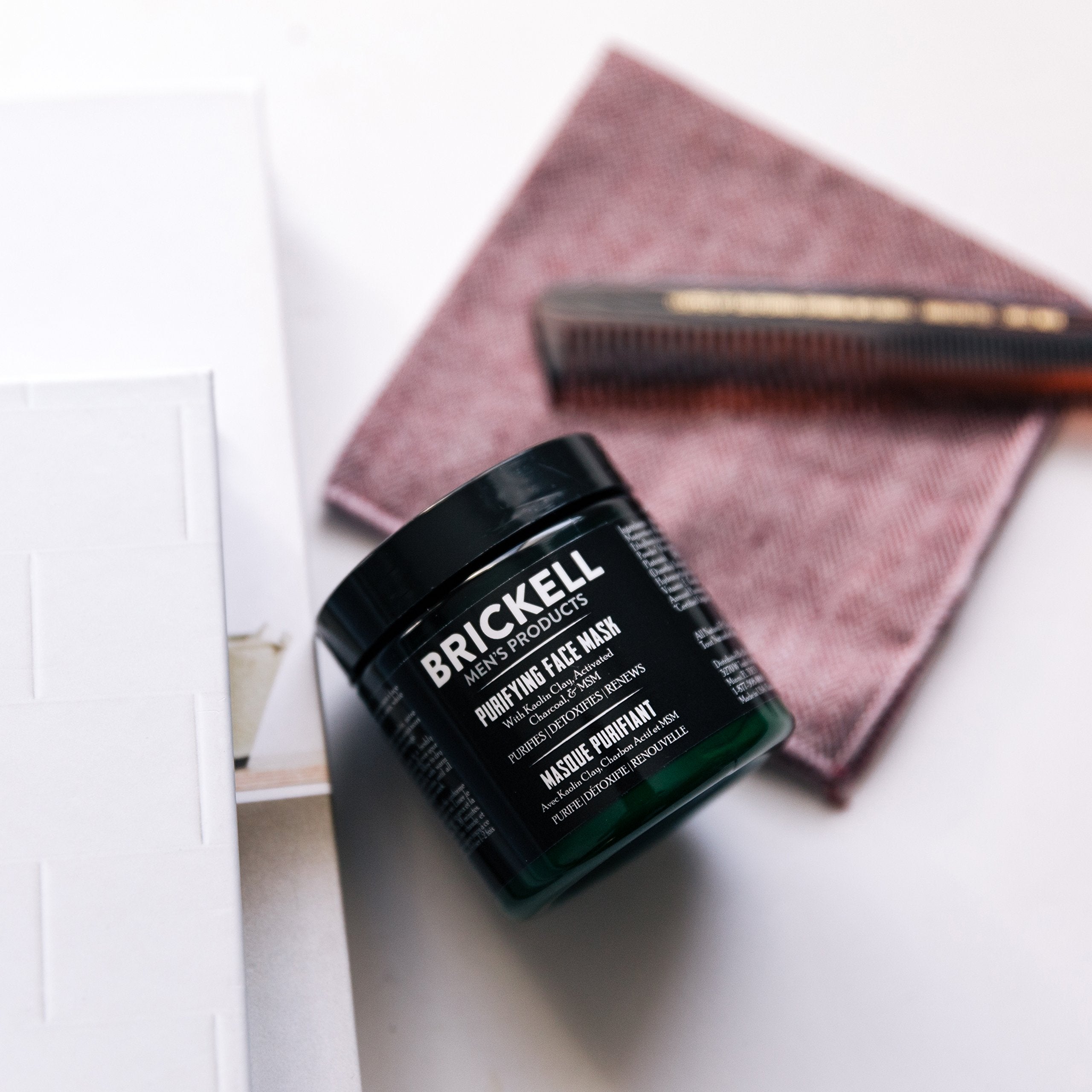 Ingredients scene highlights kaolin clay, charcoal, MSM, hyaluronic acid