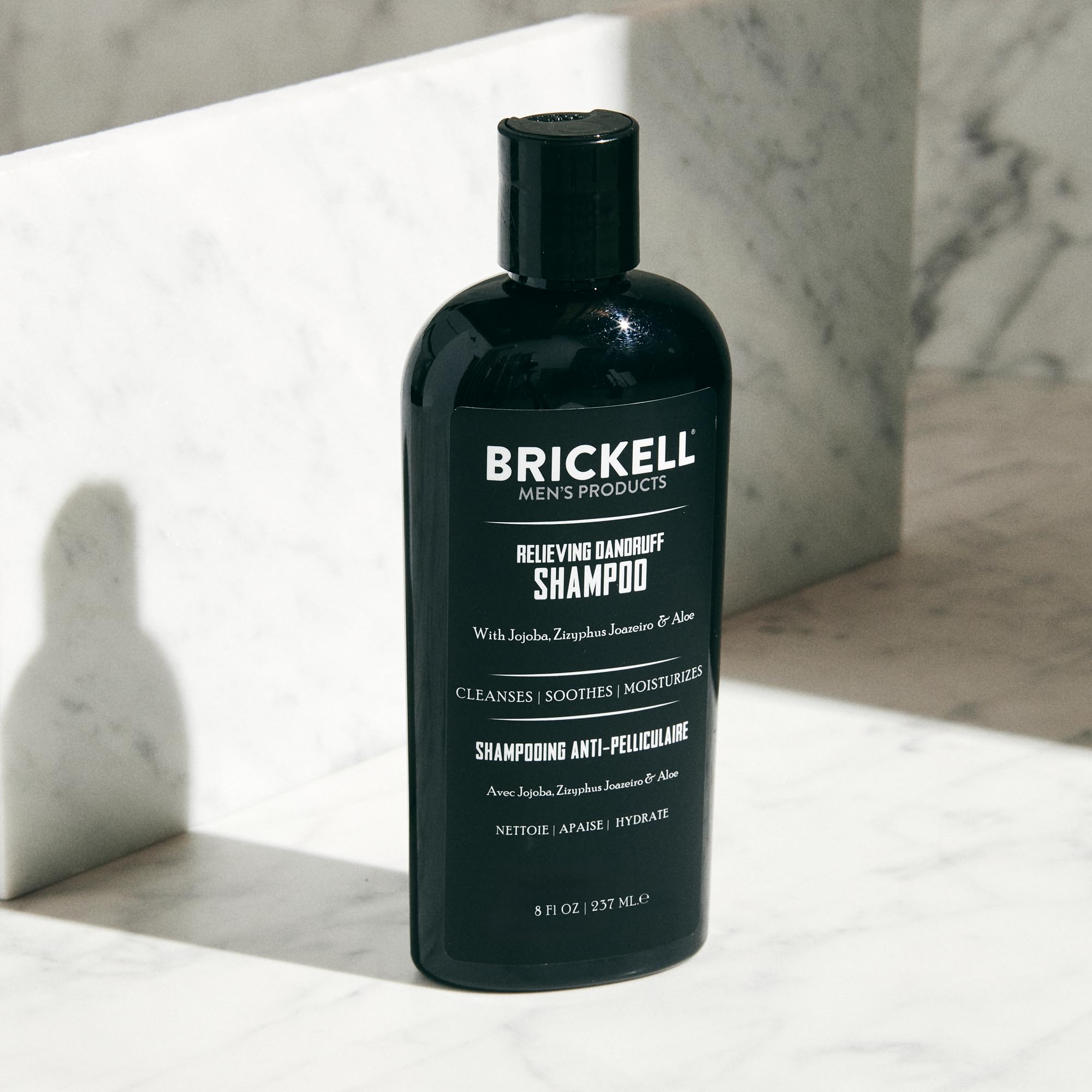 Brickell Men's Relieving Dandruff Shampoo ingredients jojoba highlights jojoba oil for moisture.