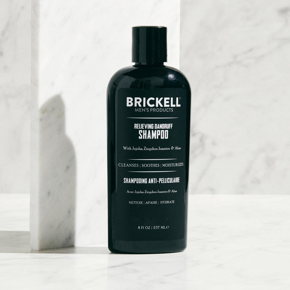 Brickell Men's Relieving Dandruff Shampoo packaging closeup emphasizes organic ingredients.