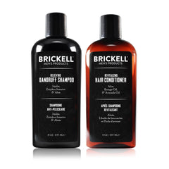 Brickell Men's Relieving Shampoo bottle pouring for balanced scalp cleanse.