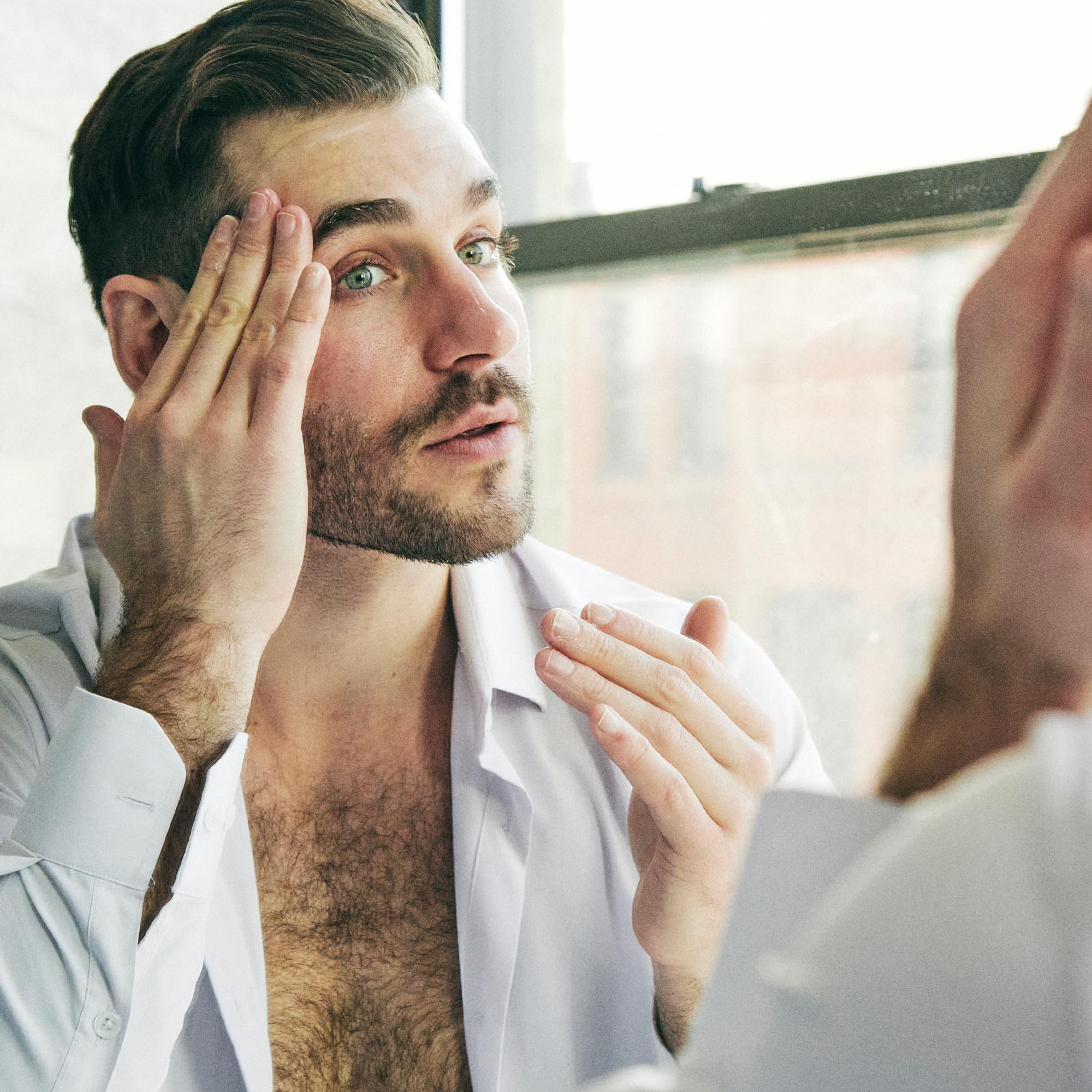 Eye-area use with Brickell Retinol Serum for gentle aging care.