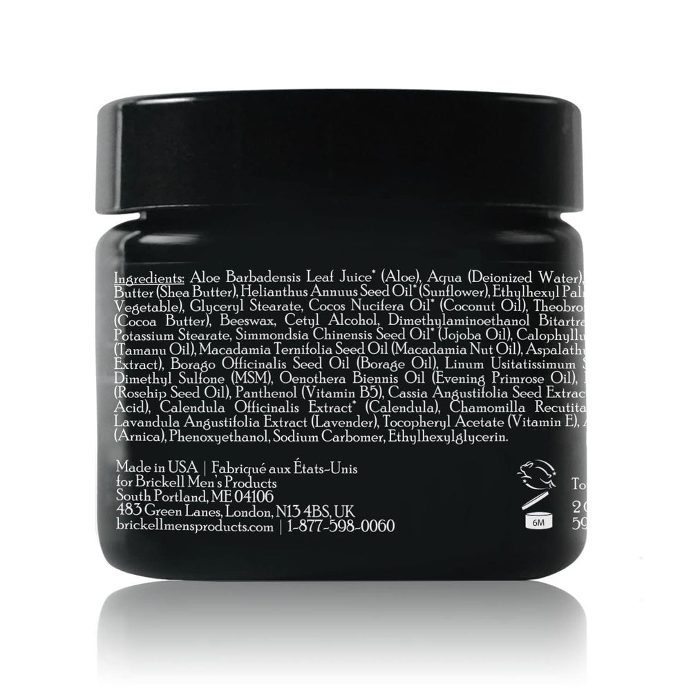 Brickell Men's Revitalizing Anti-Aging Cream jar and ingredient list in premium grooming setup.