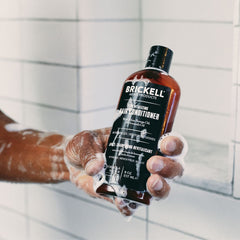 Brickell Men's Revitalizing Hair Conditioner packaging highlights natural and organic formula.