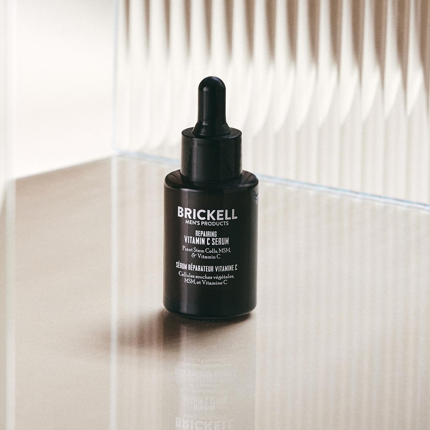 Brickell Men's serum with green tea ingredient closeup highlighting antioxidant support.