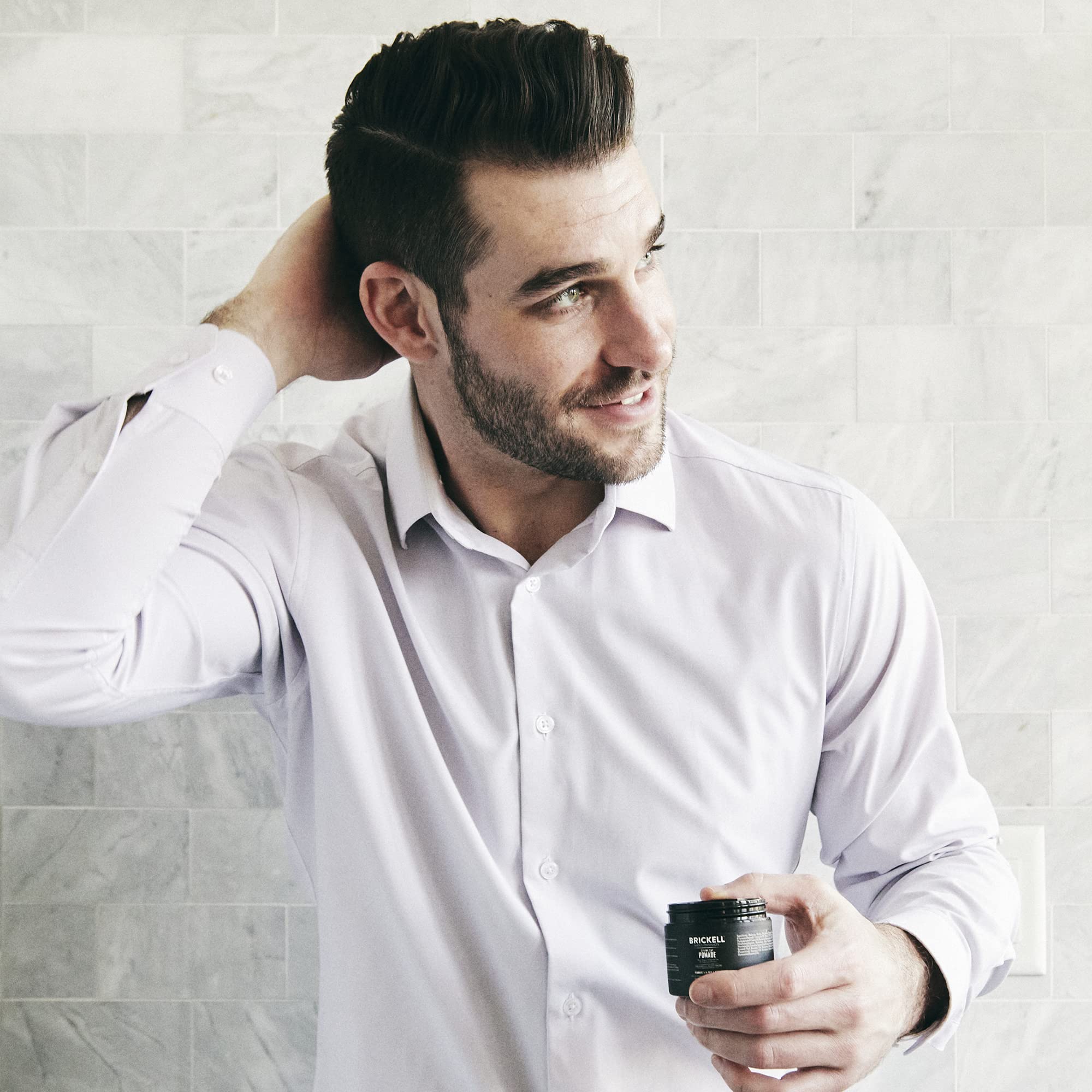 Brickell shaping paste pomade red algae extract close-up highlighting minerals.