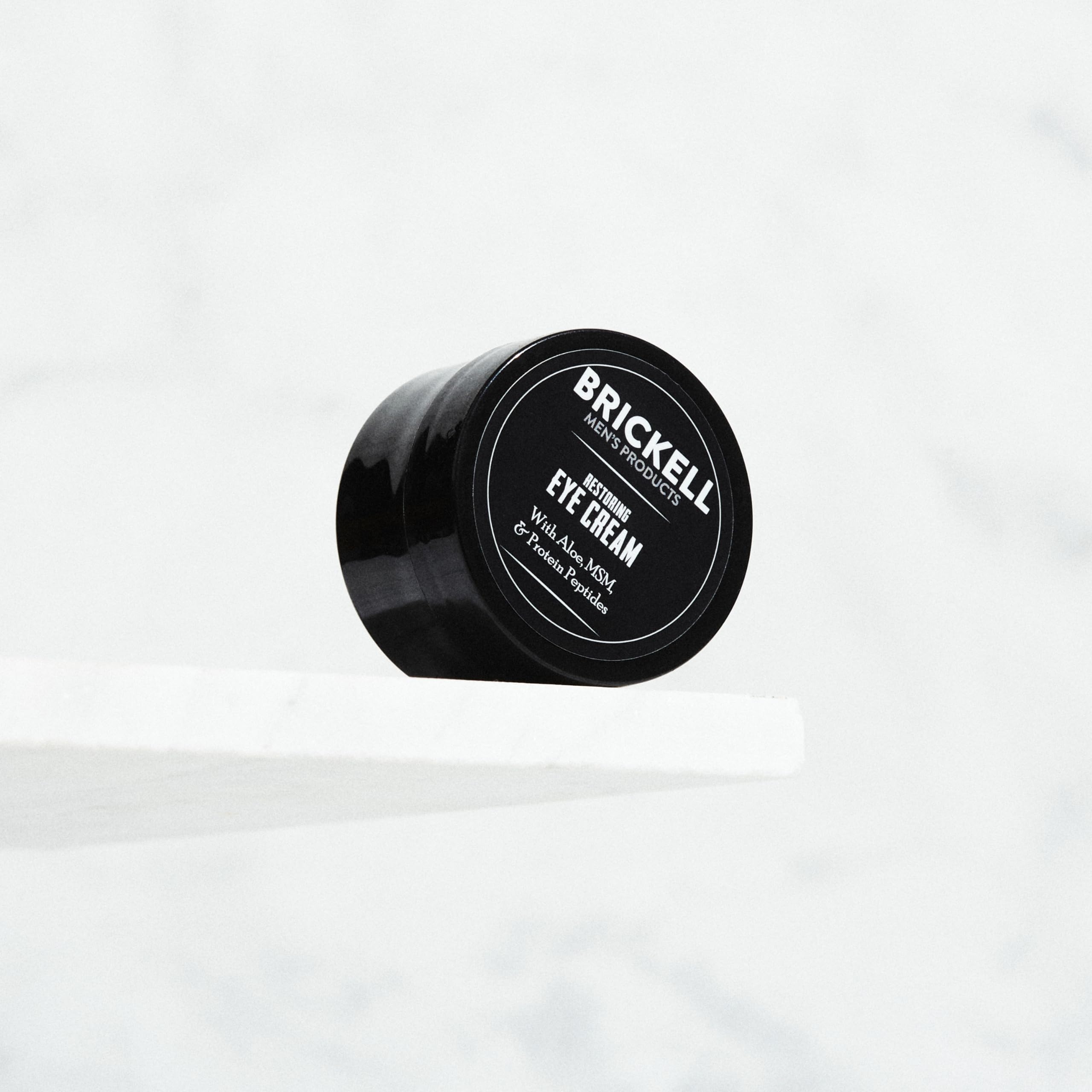 Brickell Restoring Under Eye Cream ingredients label highlights natural actives.