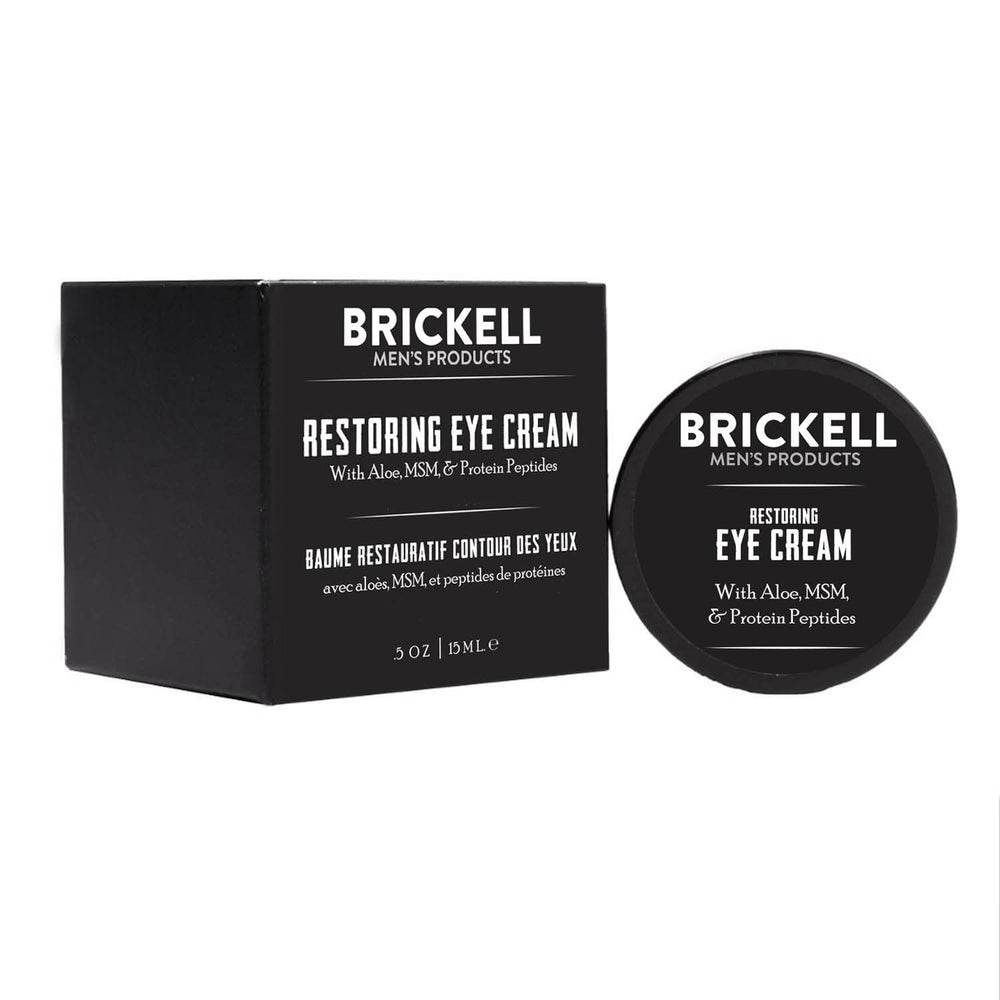Brickell Restoring Under Eye Cream packaging close-up for daily use.