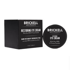Brickell Restoring Under Eye Cream packaging close-up for daily use.