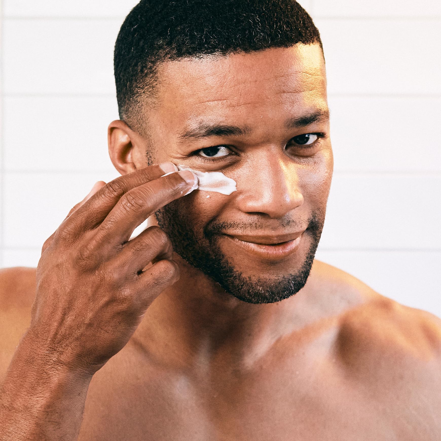 Brickell Restoring Under Eye Cream texture swatch shows lightweight absorption.
