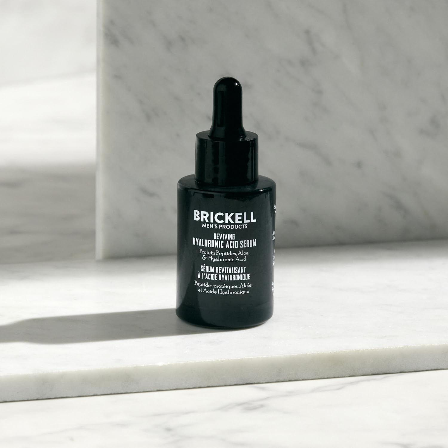 Brickell serum packaging close-up emphasizing natural organic ingredients.