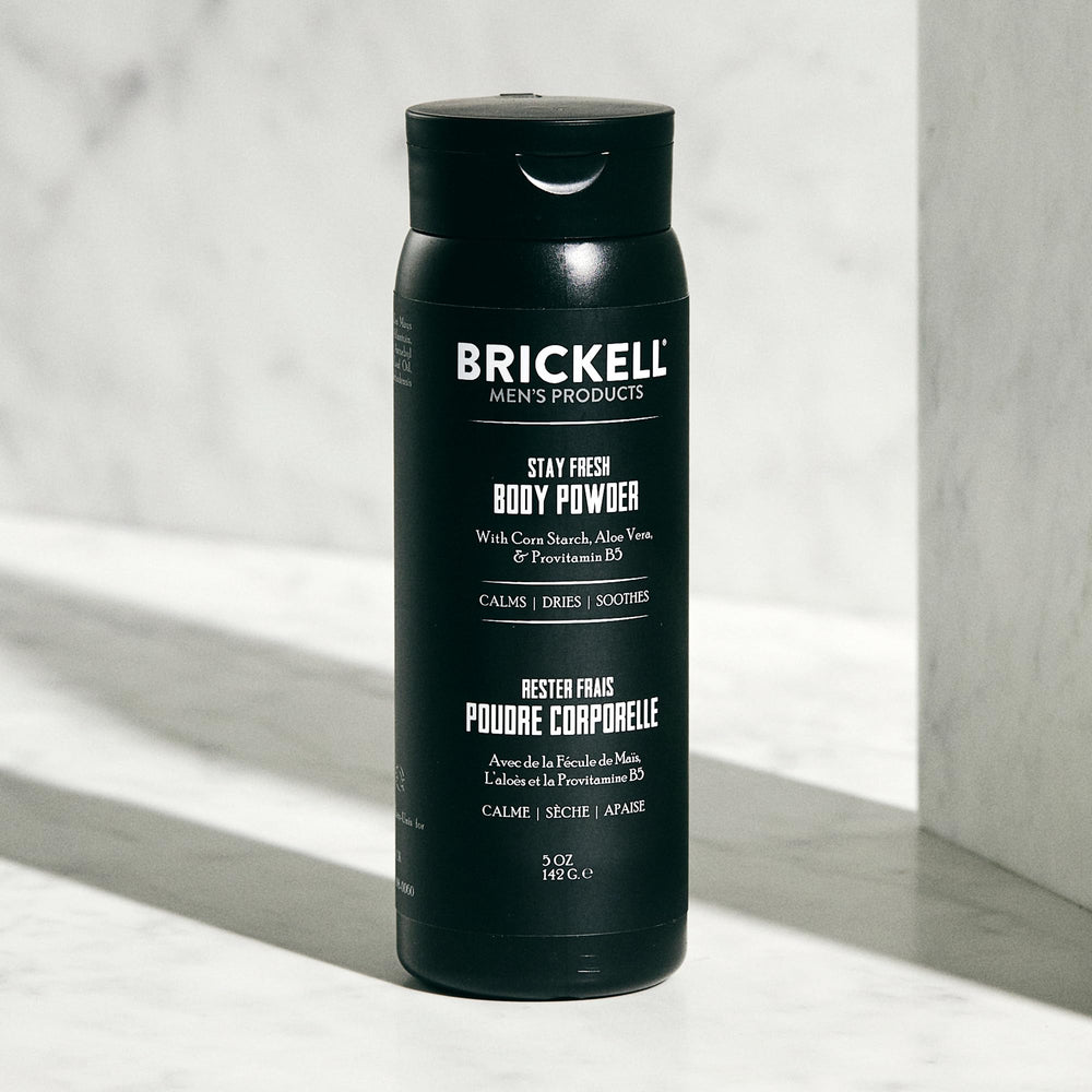 Brickell Stay Fresh Body Powder application demonstrates easy, mess-free use during workouts