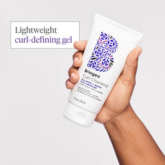 Briogeo Curl Charisma texture closeup shows smooth, frizz-control formula for humidity resistance.