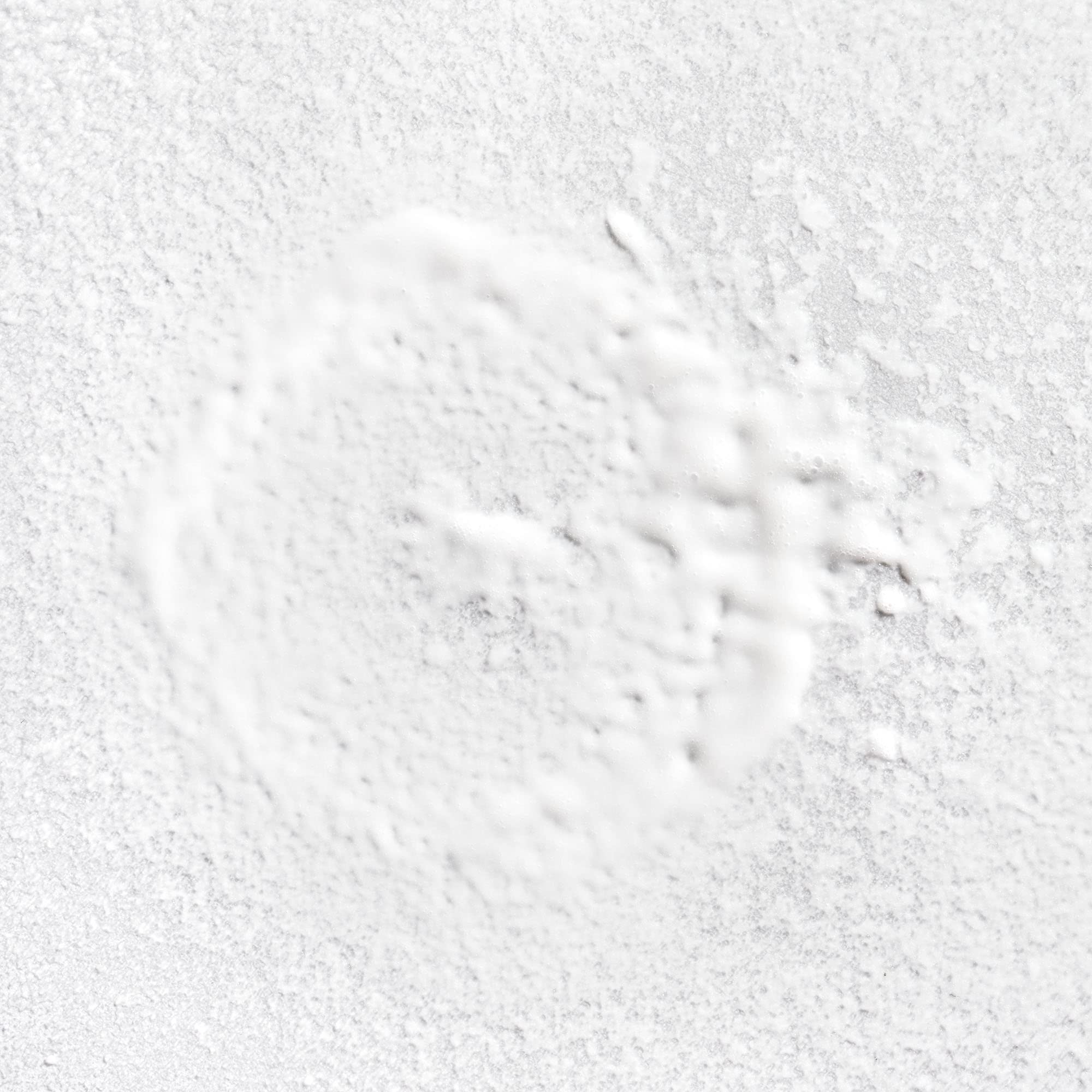 Briogeo Rosarco Milk bottle with pump highlights easy leave-in application.