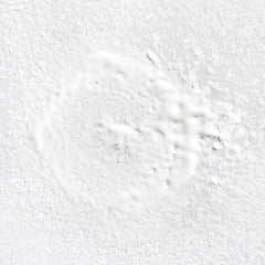 Briogeo Rosarco Milk bottle with pump highlights easy leave-in application.