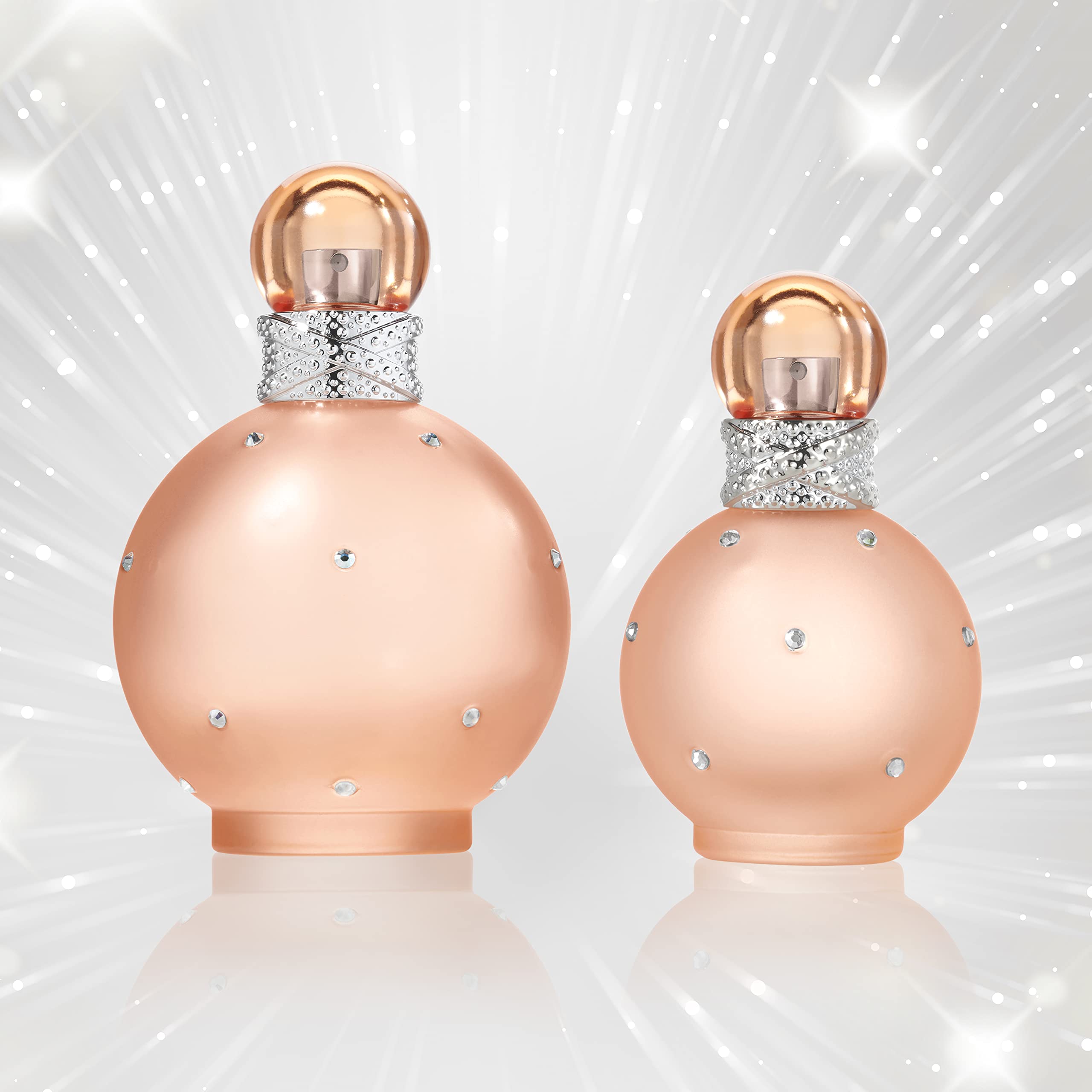 Britney Spears Naked Fantasy bottle on vanity with soft lighting for personal self-expression ritual.