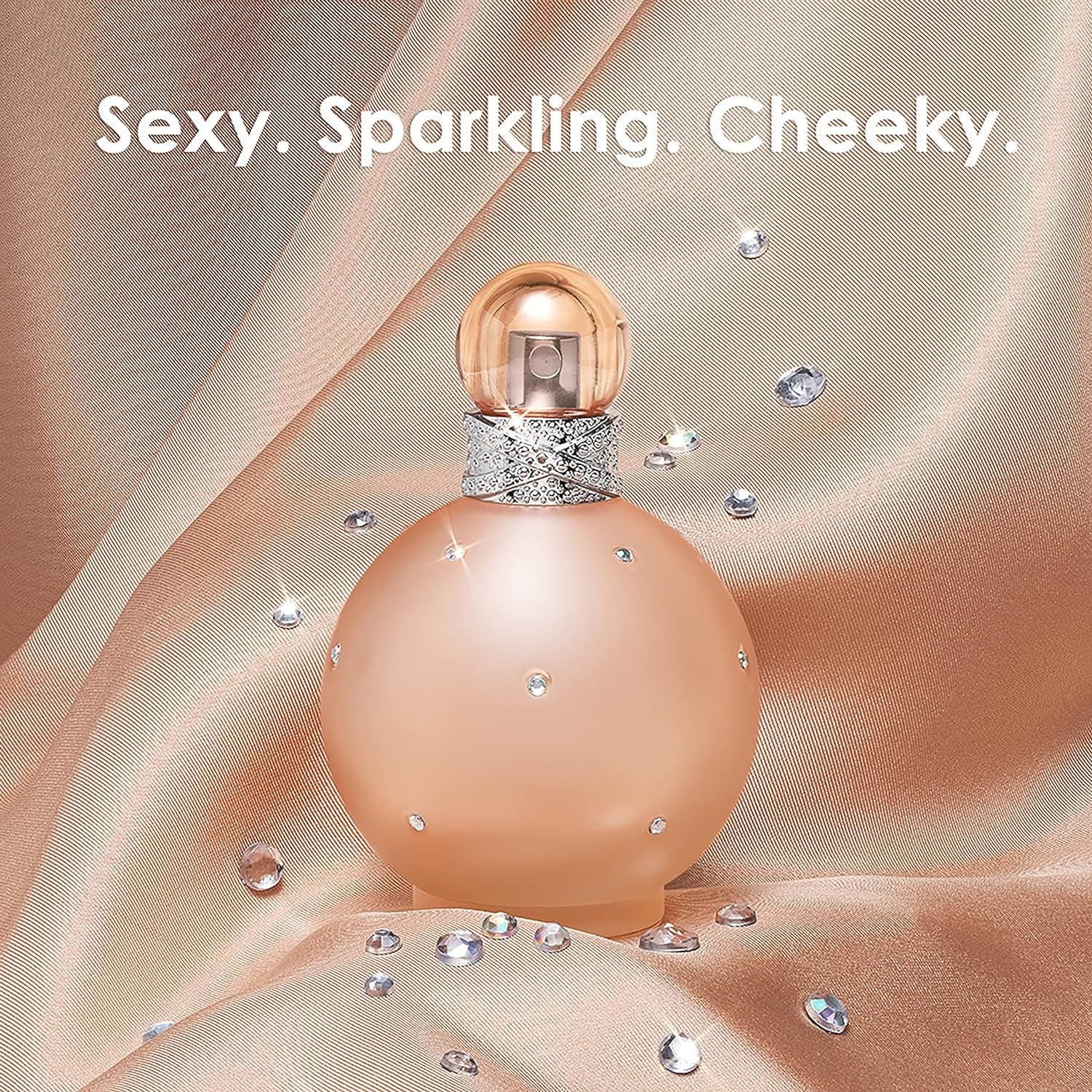 Britney Spears Naked Fantasy textured bottle surface emphasizing tactile luxury and sensory appeal.