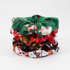 Briutn Christmas scrunchies red Santa-patterns adds playful holiday vibe to buns and ponytails
