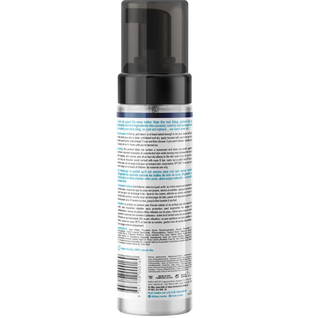 BTAN Clear Bronzing Water Foam being dispensed with a mitt for even application