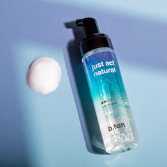 BTAN Self Tanner Foam applied to arm and leg for body use