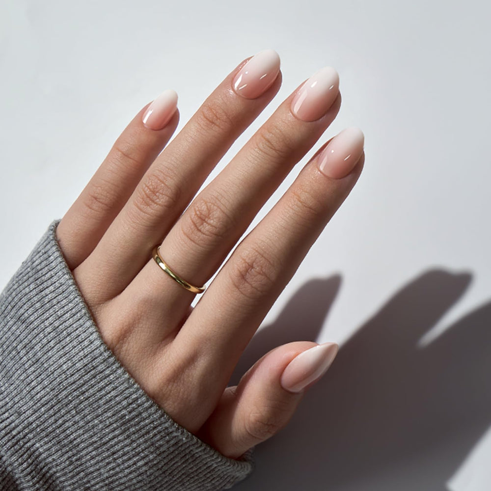 BTArtbox extra-short nails in nude-ombre tone offer comfortable wear for daily tasks.