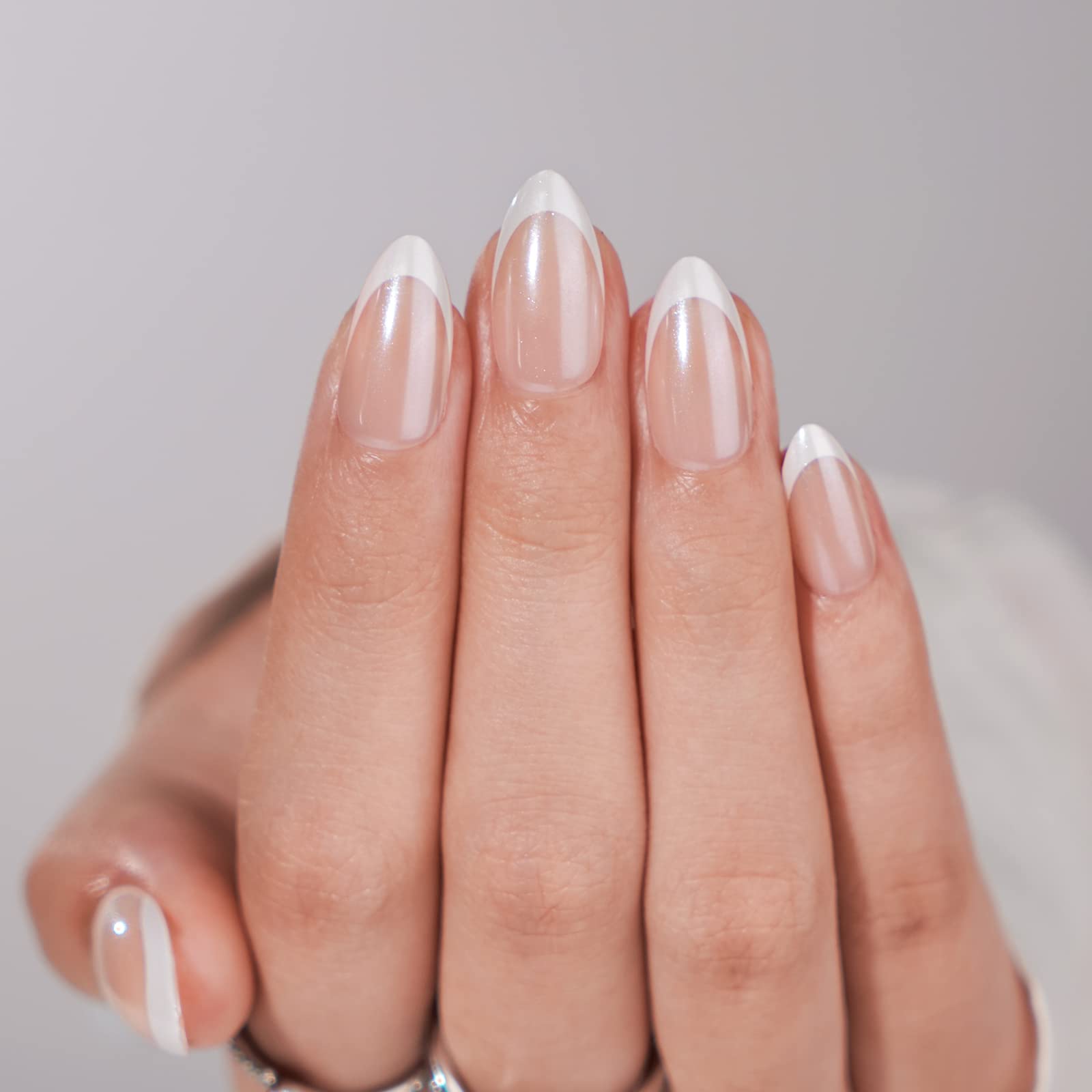 BTArtbox French Tip Nails in white almond medium on display for a chic salon-like manicure.