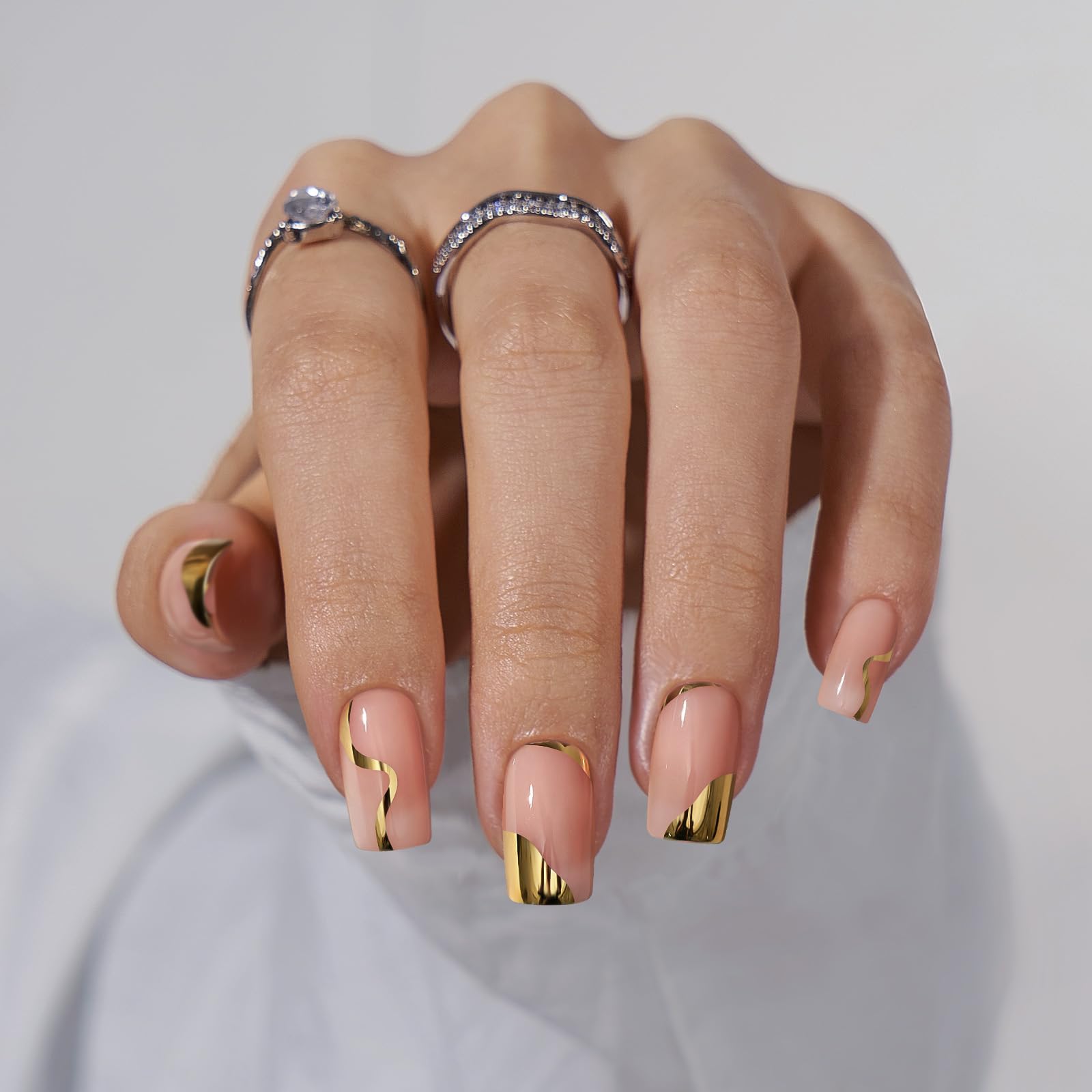 BTArtbox gold leaf nail closeup showing shiny finish and long wear