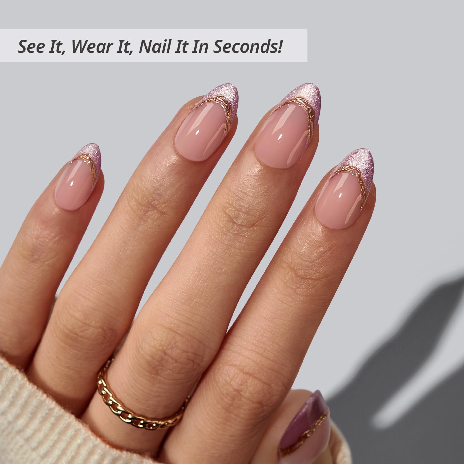 BTArtbox Pink Aurora nails on hand showing almond shape and 3D gold line detail for an elegant look.