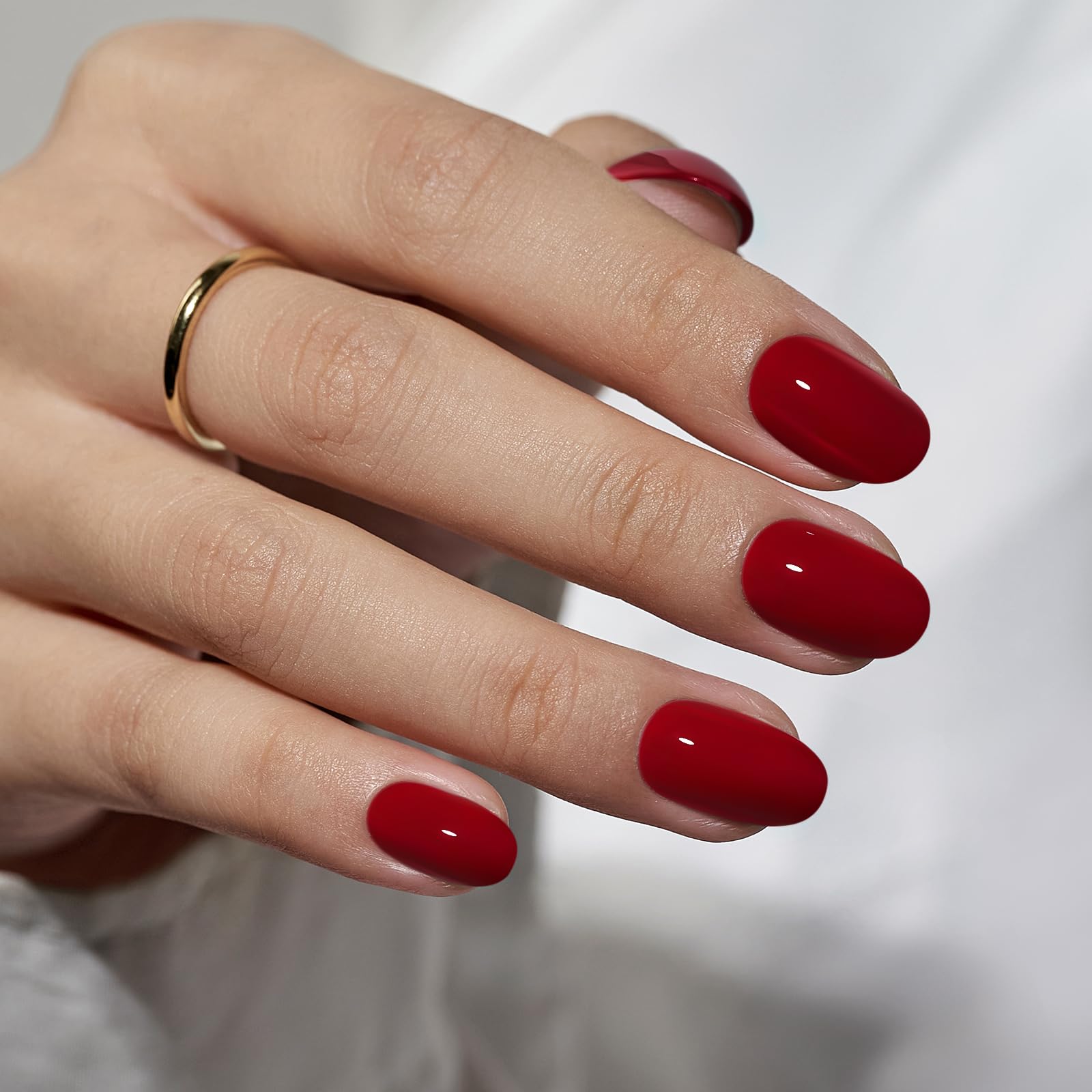 BTArtbox press-on nails red short oval closeup for quick salon-style nails