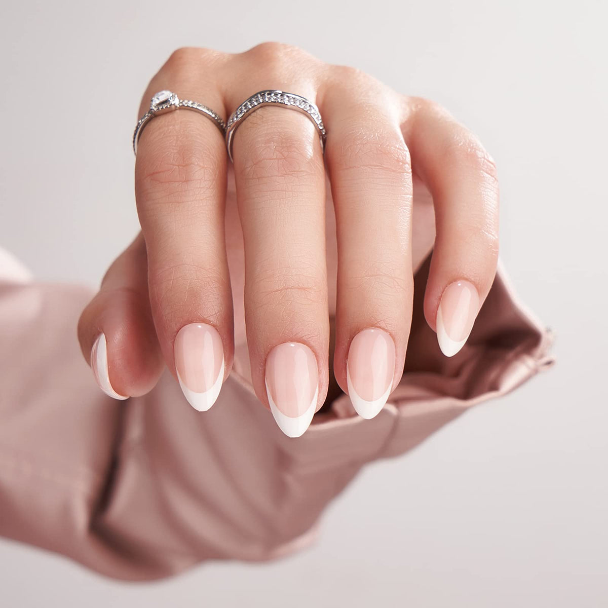 BTArtbox press-on nails short almond French tip packaging promises quick salon-style nails.
