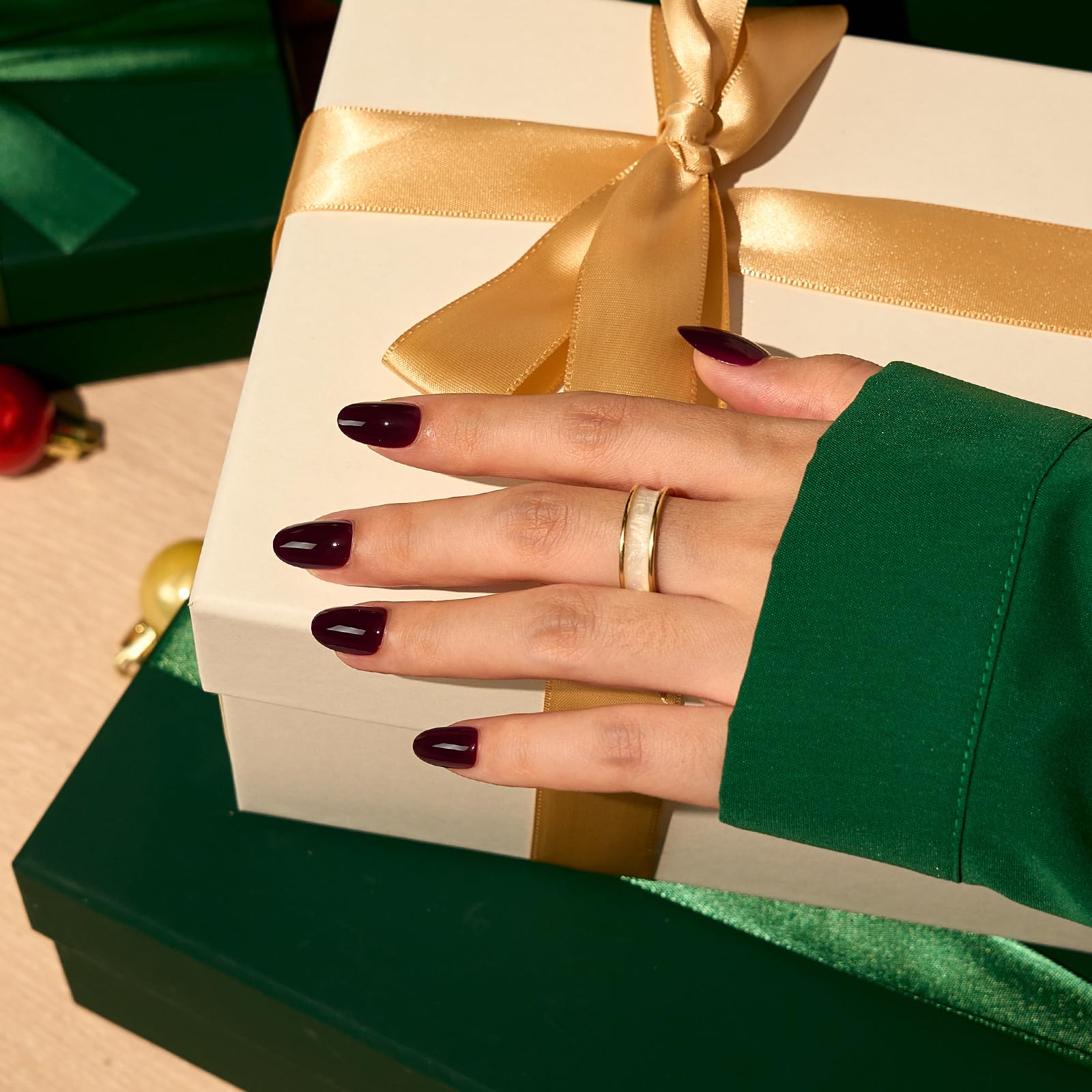 BTArtbox short dark red oval nails set reveals 16 sizes for a custom fit.
